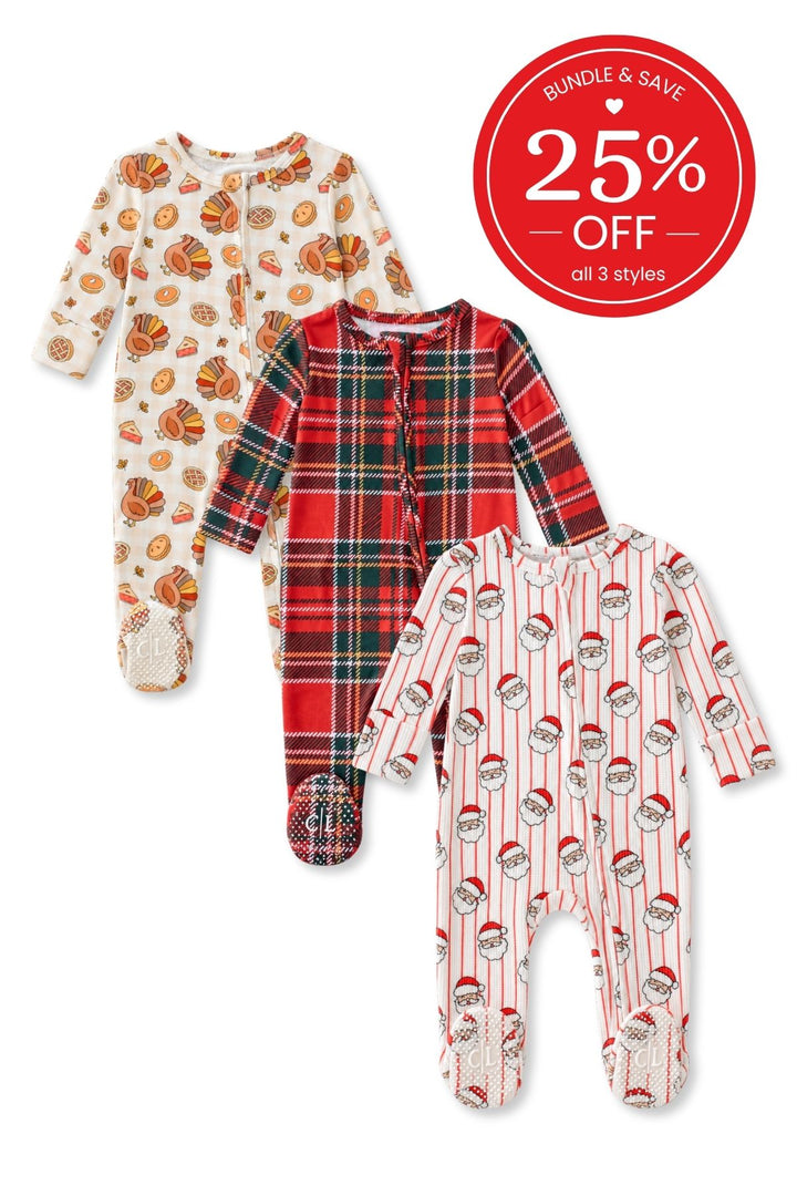 Flat lay of a Caden Lane bundle of three zip footies in turkey-and-pie, red tartan, and striped Santa prints, with a badge reading “Bundle & save 25% off.”