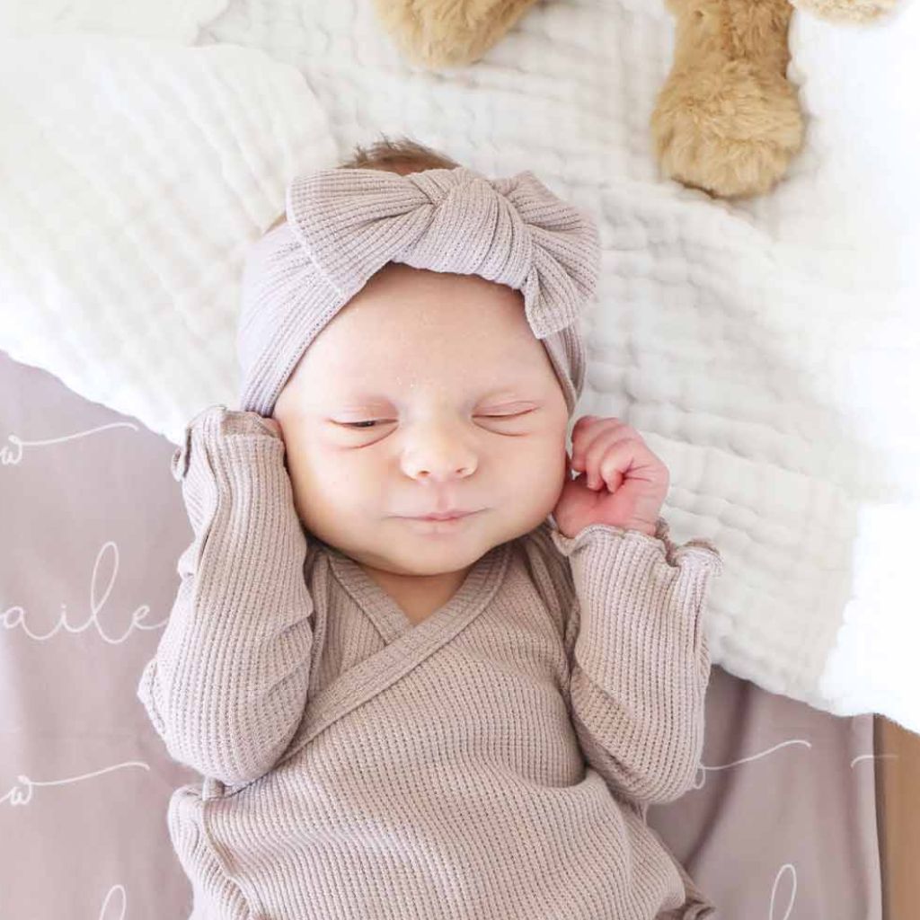 Baby wearing the Mocha waffle headwrap