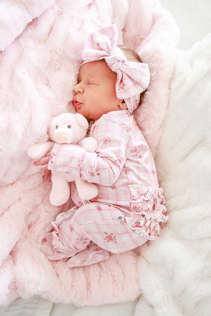 Sleeping baby with teddy bear wearing Primrose Plaid knit bow headwrap