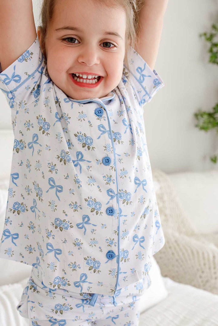 smiling girl in tied in blooms lounge set