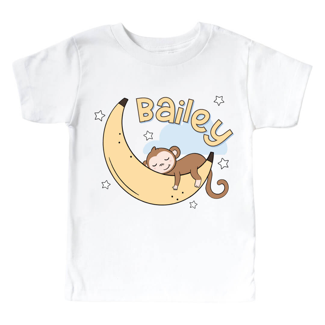 graphic tee for kids with sleeping monkey on a banana moon personalized with name