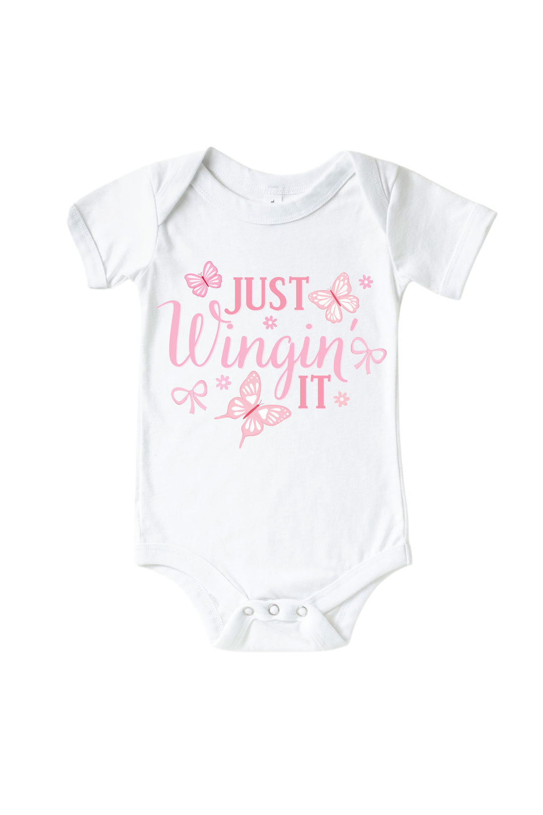 Just Wingin' It Graphic Bodysuit in Blooming Butterflies print - baby bodysuit featuring pink "Just Wingin' It" text with butterfly and bow accents