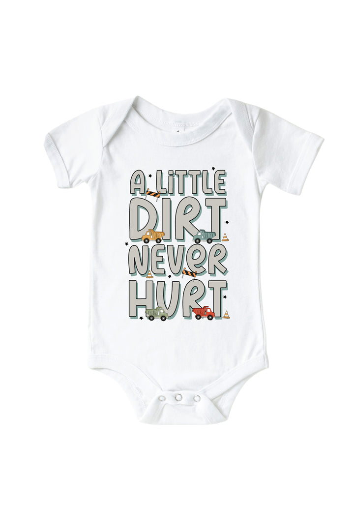Flat lay of a Caden Lane white short-sleeve bodysuit in a Busy Builder print featuring four dump trucks tucked among stacked letters reading "A little dirt never hurt."