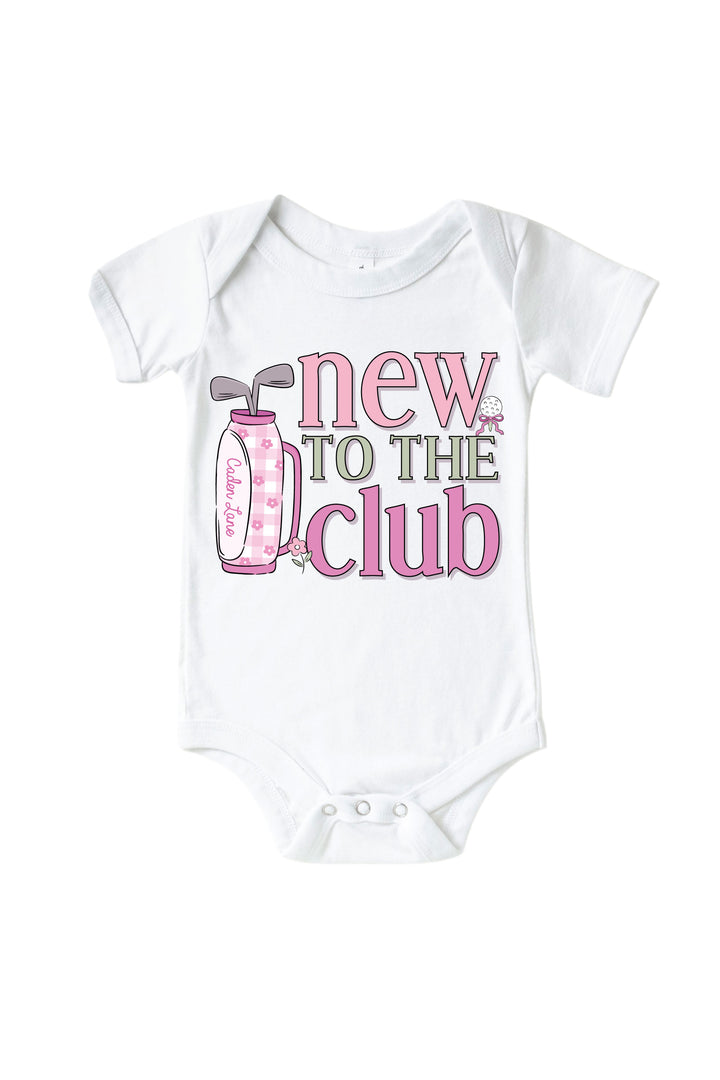 pink new to the club golf graphic bodysuit in white, caddie crew, flat lay