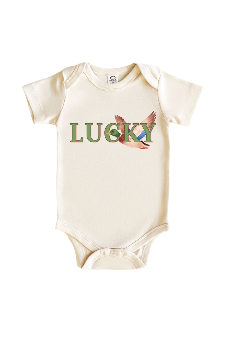 Natural baby bodysuit with LUCKY text and flying mallard duck illustration on front