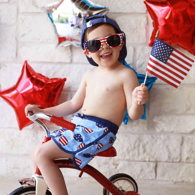 above the knee swim trunks for boys red, white and blue sunglasses for the 4th of july 