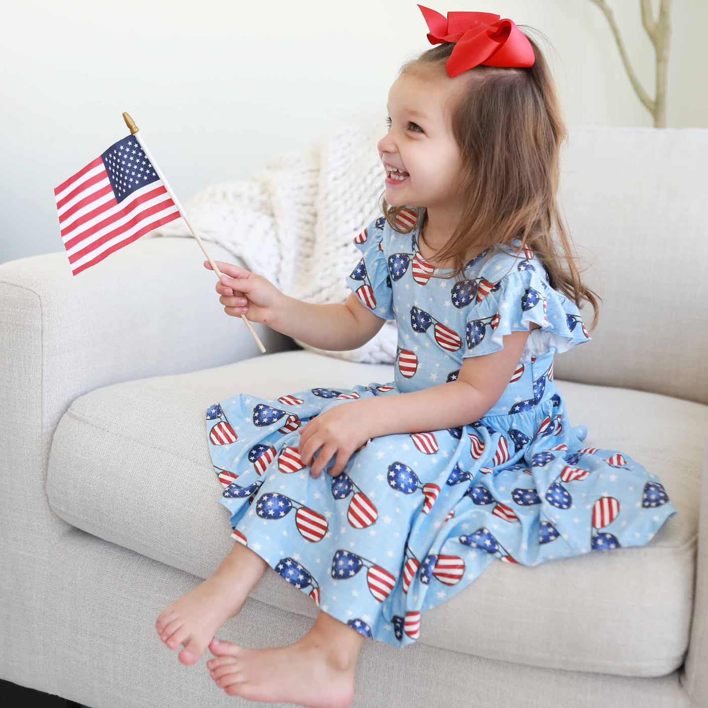 lightweight fouth of july dress for girls with red, white and blue sunglasses 