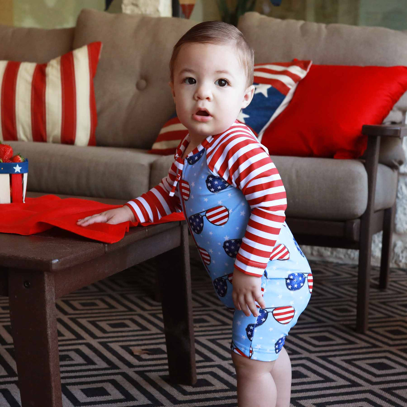 red, white and blue sunglasses swim romper for the 4th of july for babies 