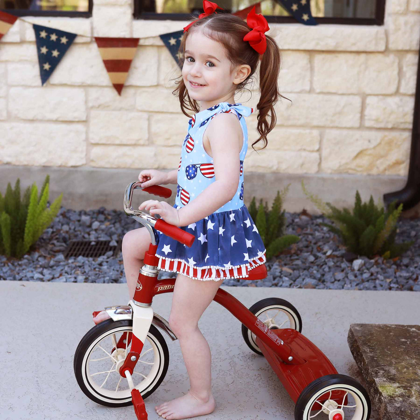 flag sunglasses and tiered skirt swimsuit for girls 