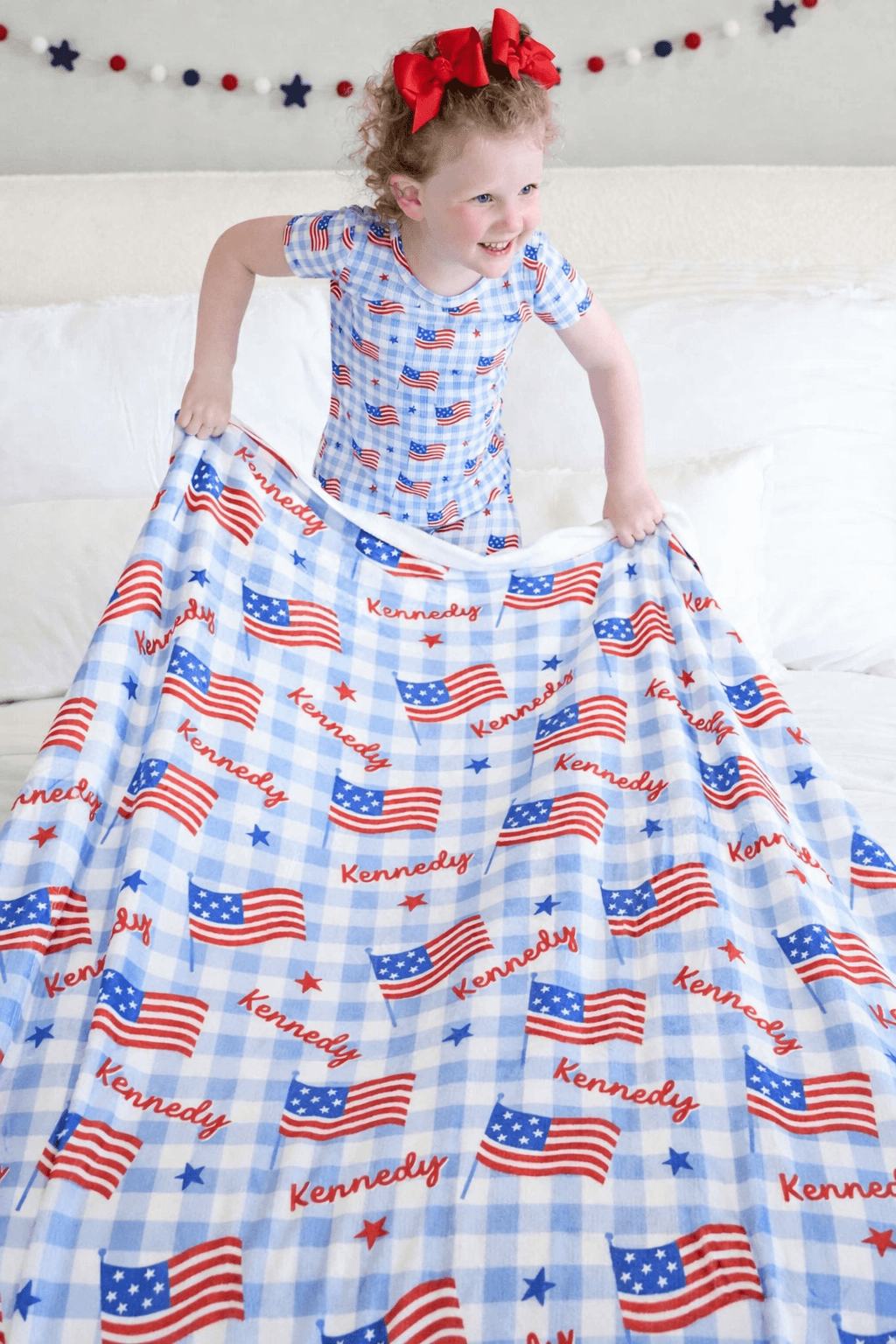 lifestyle photo of bamboo waffle kids blanket - star spangled picnic