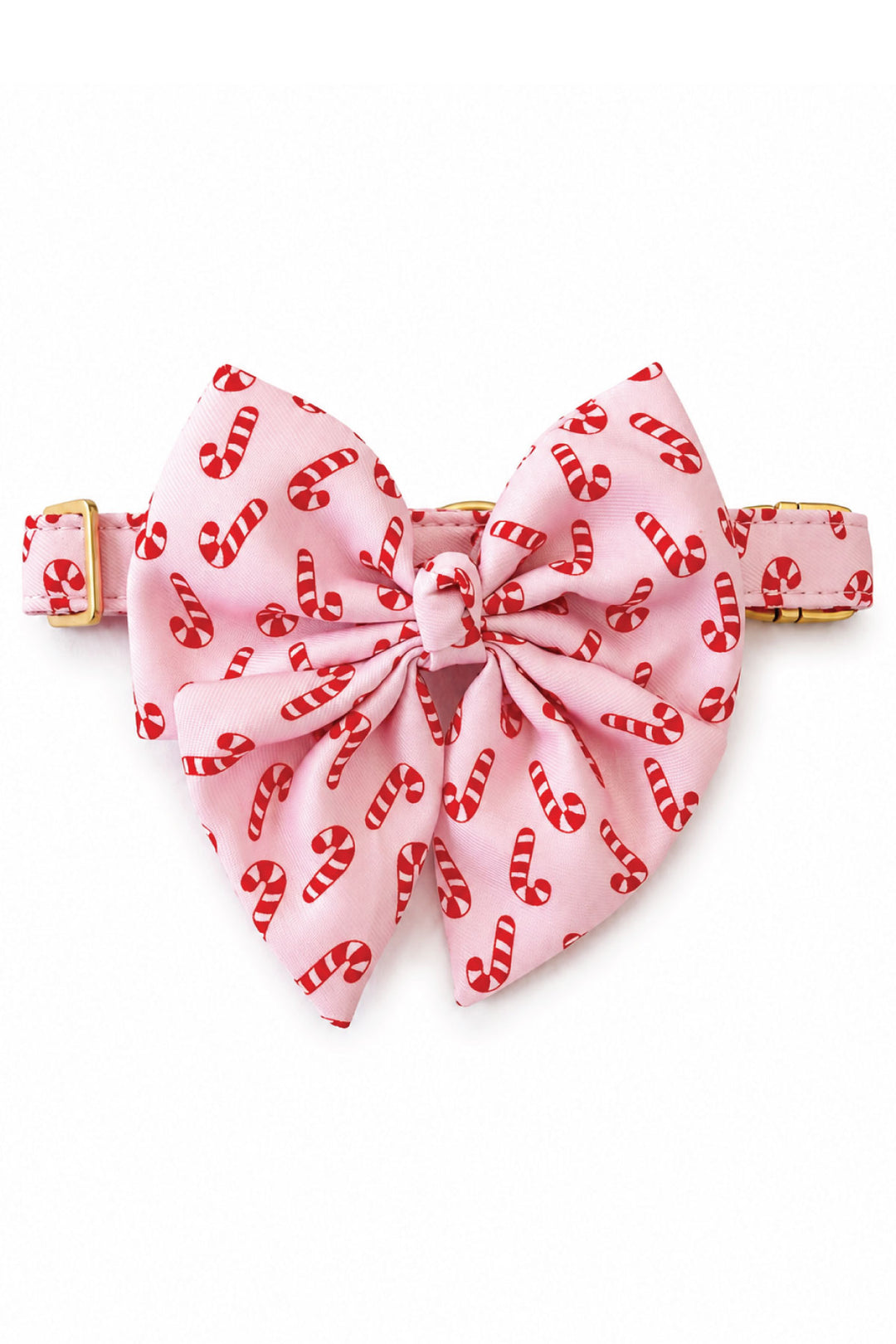 Lane & Leash Peppermint Stroll dog collar in pink with candy cane print and matching oversized sailor bow, gold hardware, on a white background