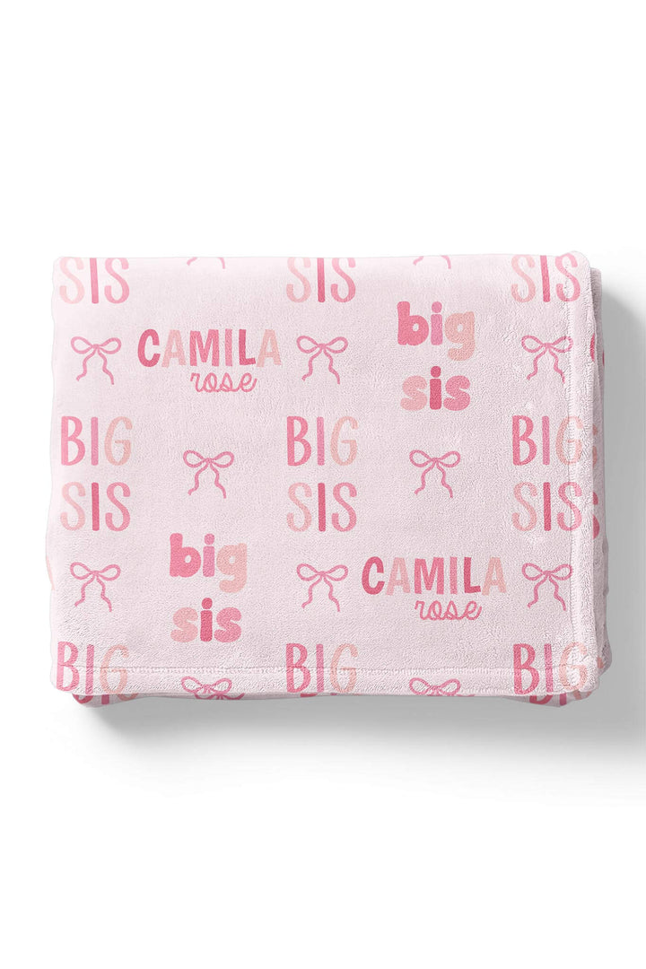folded pink sis personalized bow blanket in pink 