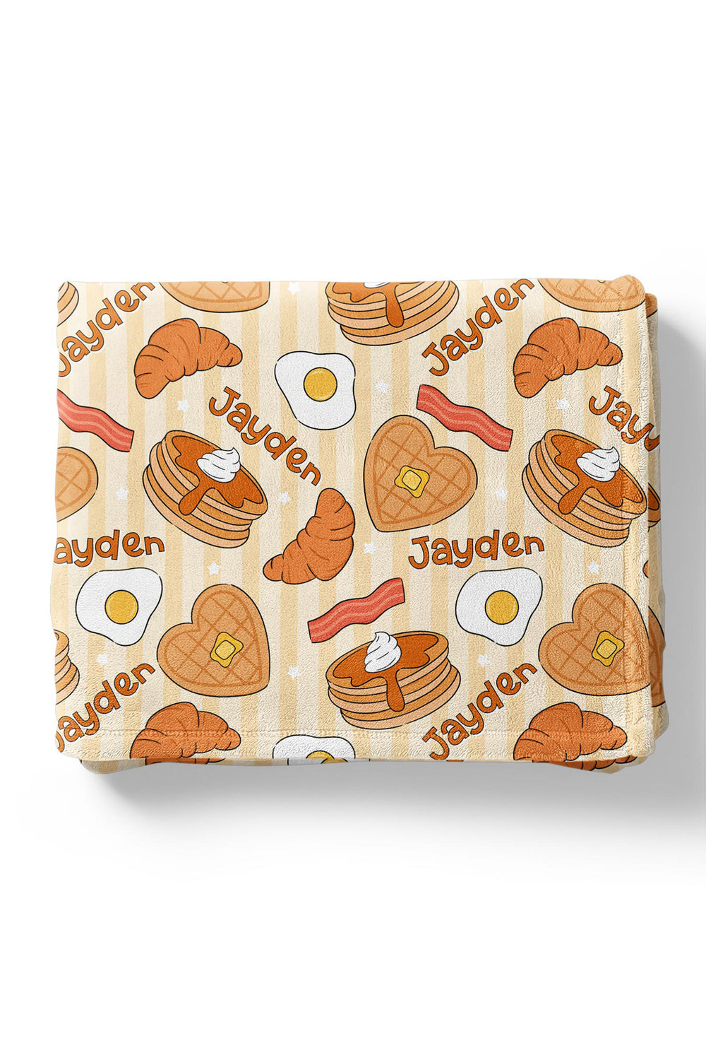 Caden Lane personalized brunch blanket featuring waffles, pancakes, bacon, eggs and croissants with a custom child’s name.