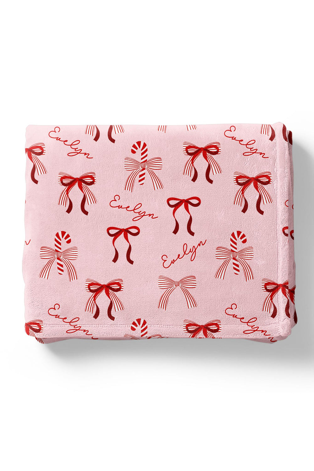 Caden Lane Personalized Peppermint Bows Kids' Christmas Blanket with custom name, festive red bows, candy canes, and ultra-soft plush fabric.