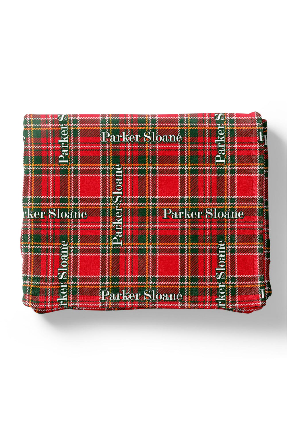 Caden Lane personalized Christmas blanket in classic red and green plaid featuring a custom repeating name design, made from soft fabric for cozy holiday snuggles, matching family pajamas, and personalized Christmas gifts.