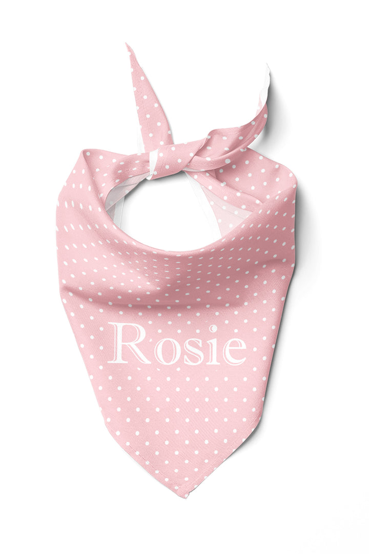 Pink polka dot pet bandana tied in a knot, personalized with the name Rosie in white lettering