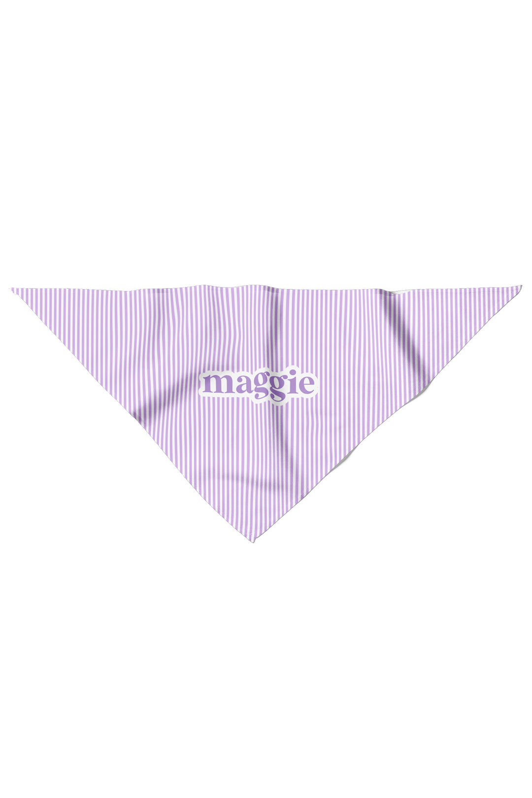Flat lay of a lavender and white striped pet bandana in a triangle shape with the name "maggie" printed in purple script