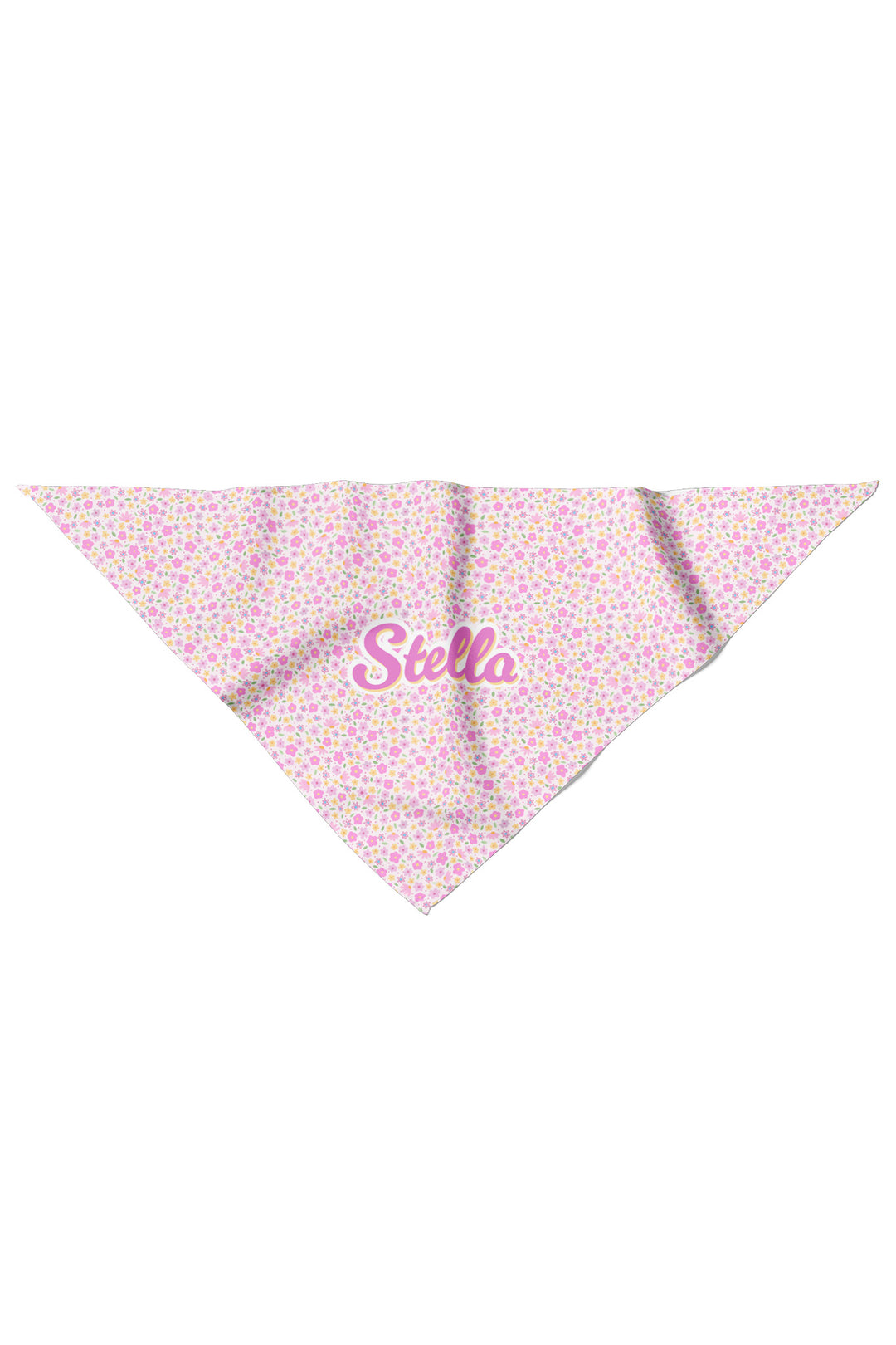 Flat lay of personalized pet bandana in Scattered Blooms print, showing pink, purple, and yellow ditsy floral pattern with pet name in pink script on the front point