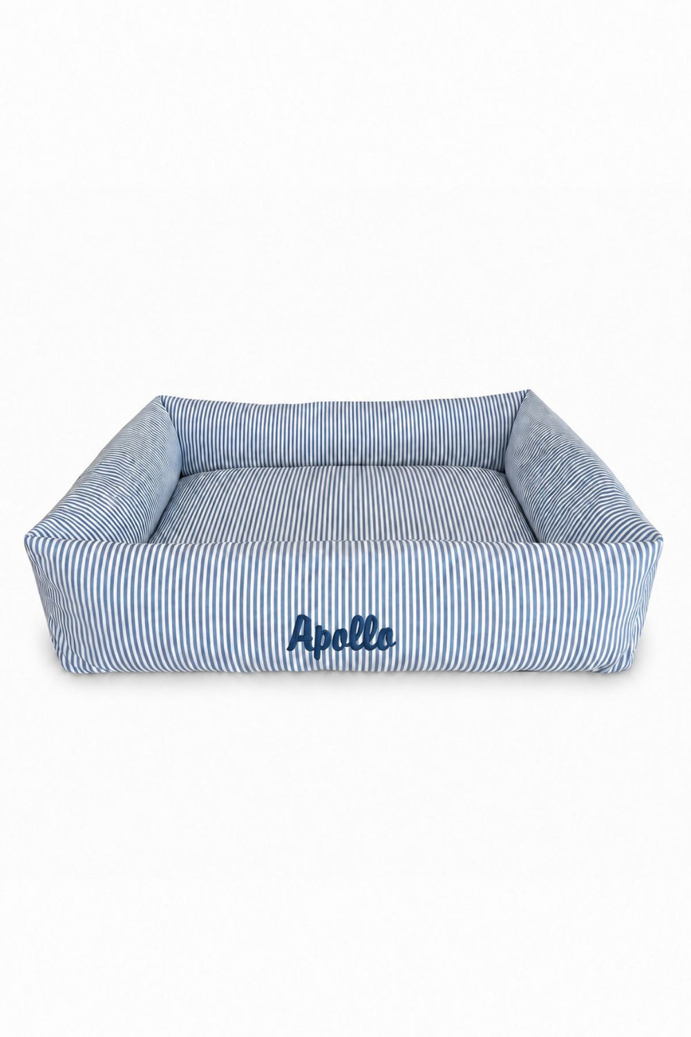 A square Lane & Leash pet bed with a blue and white striped fabric, featuring the name 'Apelle' embroidered in navy blue on the front, set against a plain white background.