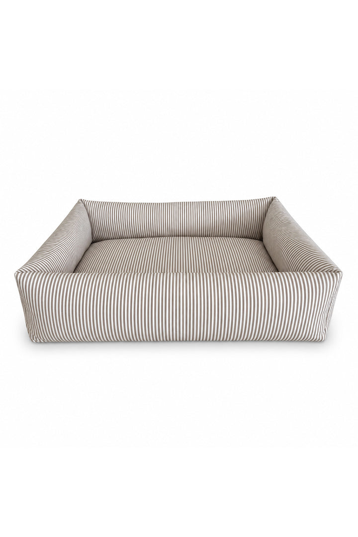 A rectangular Lane & Leash high-sided pet bed with a beige and white vertical stripe pattern, shown from a front-facing perspective on a solid white background.