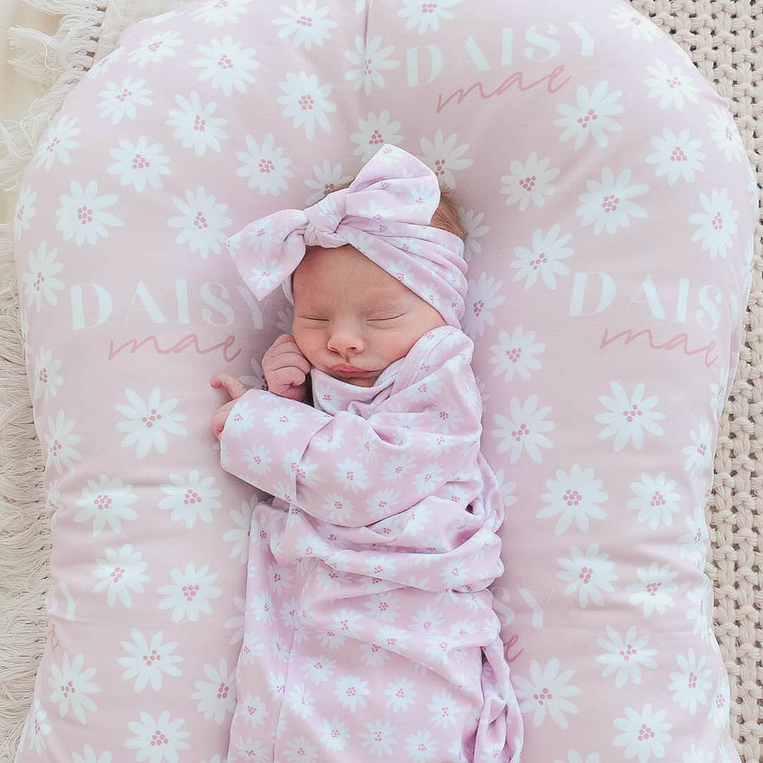 pink personalized swaddle with daisies 