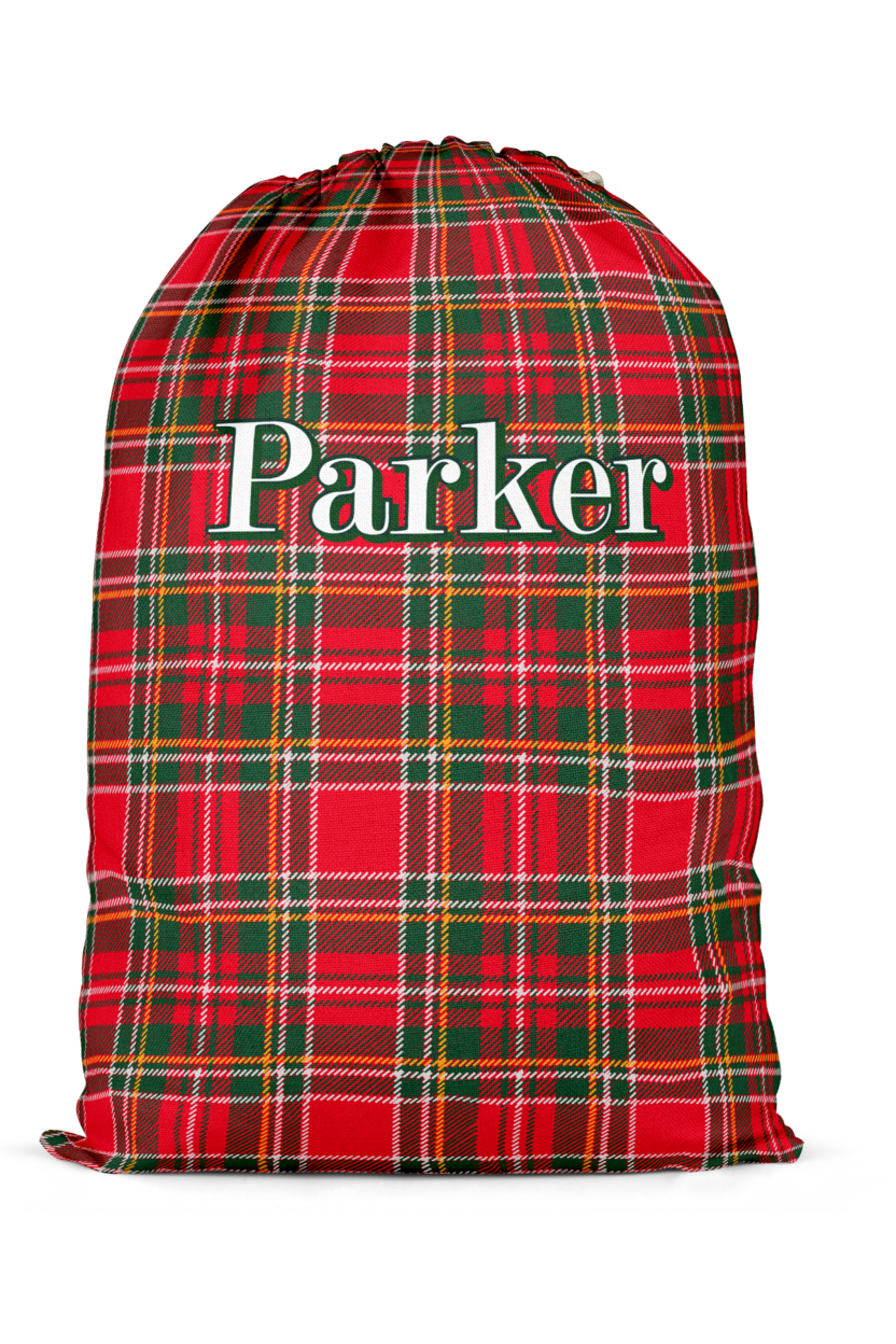 Caden Lane personalized Christmas Santa sack featuring a custom name on a classic red and green plaid design, perfect for holiday gift storage, matching family pajamas, and festive Christmas traditions.