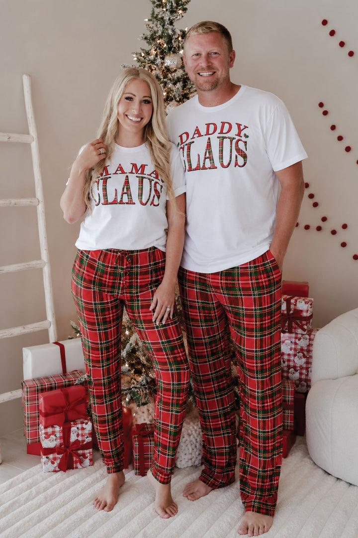 Caden Lane Plaid Tidings matching family Christmas pajamas featuring Mama Claus and Daddy Claus graphic tees paired with red and green plaid adult holiday pajama pants.