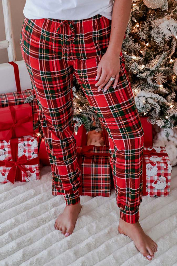 Caden Lane Plaid Tidings adult Christmas jogger pajama pants in classic red and green plaid, styled for matching family holiday pajamas and cozy Christmas mornings.