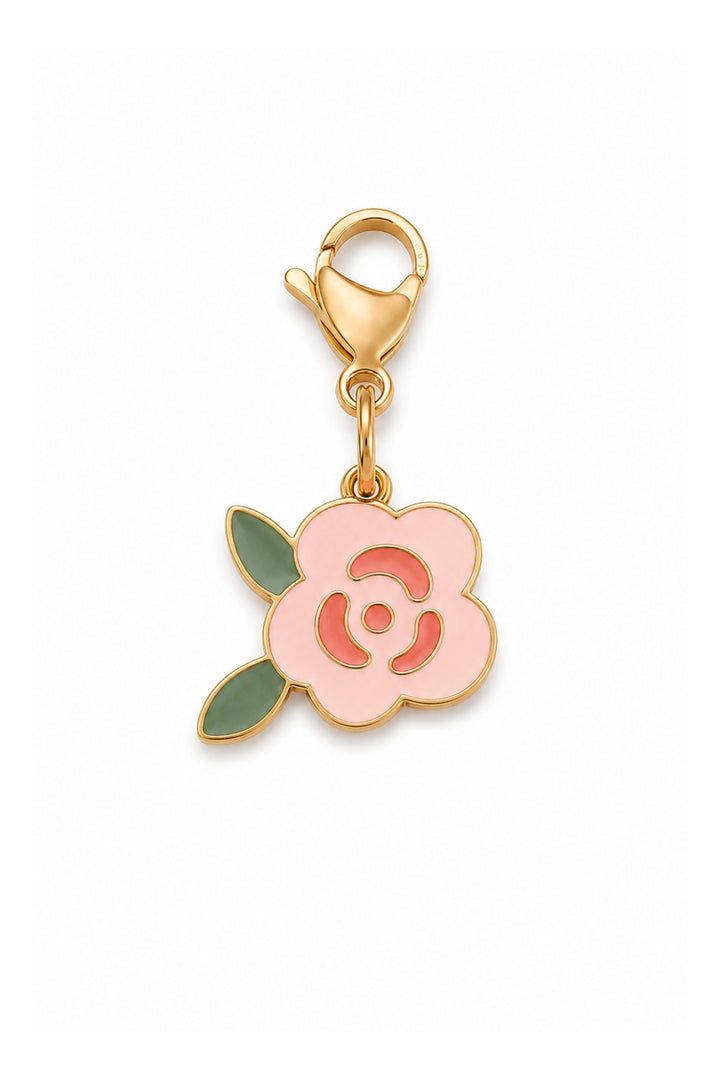 A Lane & Leash gold-plated floral charm featuring a light pink rose with green leaves and a lobster clasp, shown on a plain white background.