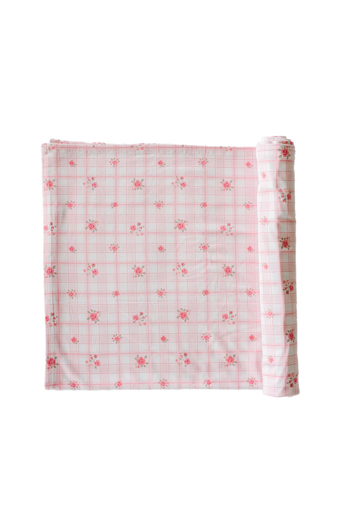 Primrose Plaid oversized swaddle blanket folded and rolled