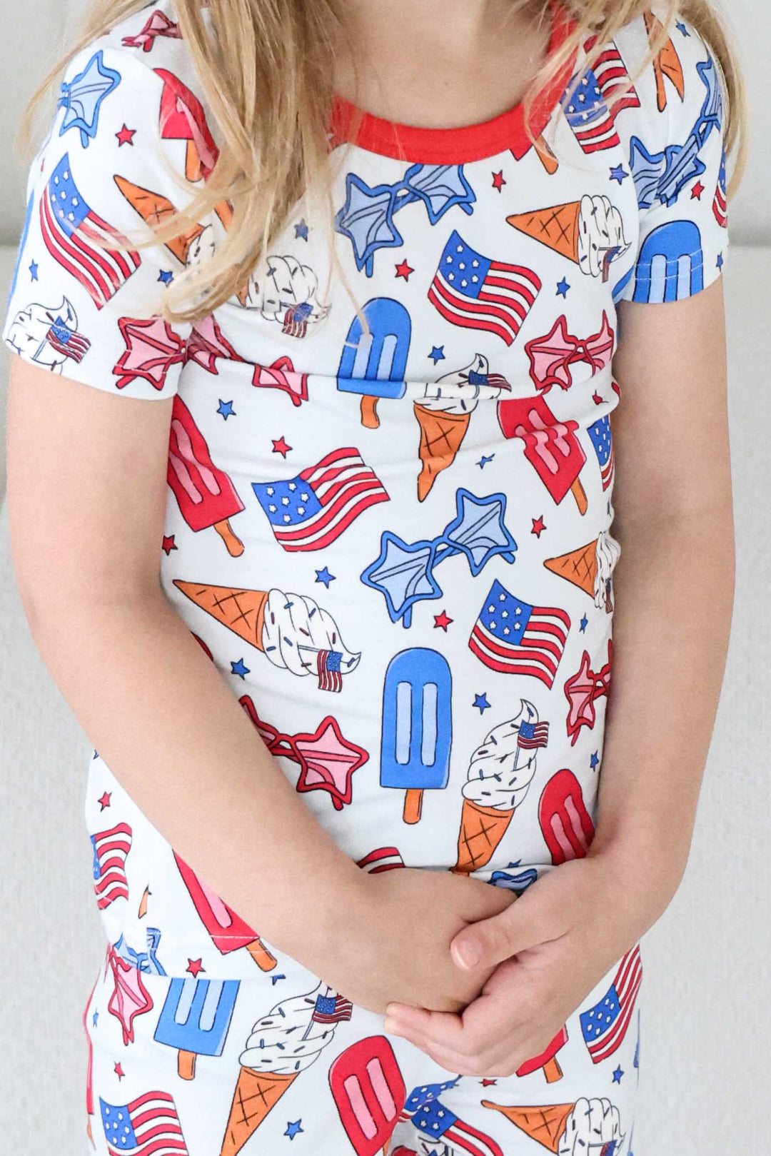 close-up of red white and cool two piece pajama set - caden lane bamboo 4th of july print
