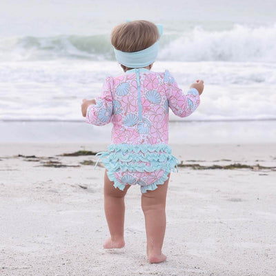 ruffle bottom rash guard swimsuit with long sleeves pink and blue 