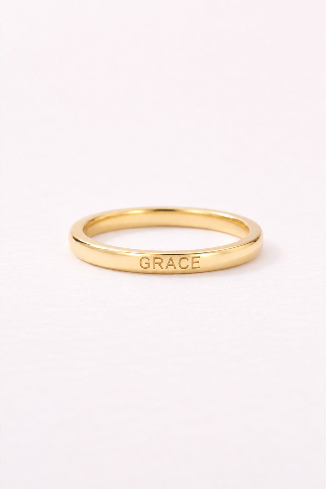 Caden Lane personalized gold name ring engraved with Grace on a clean white background.