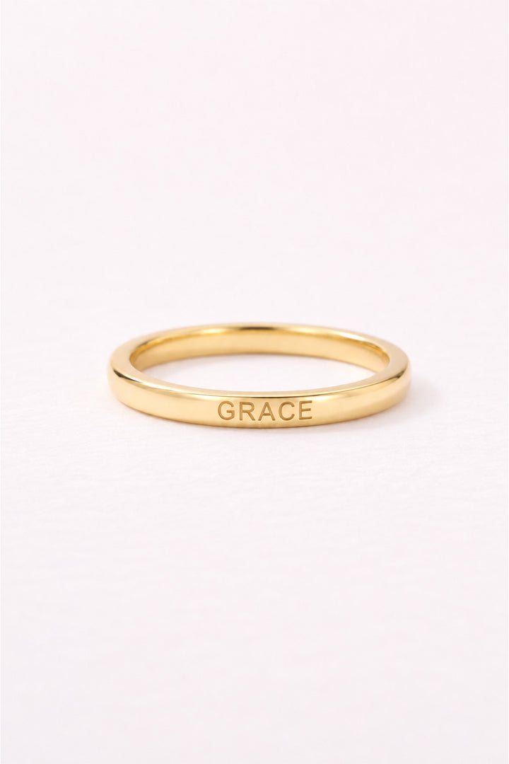 Caden Lane personalized gold name ring engraved with Grace on a clean white background.