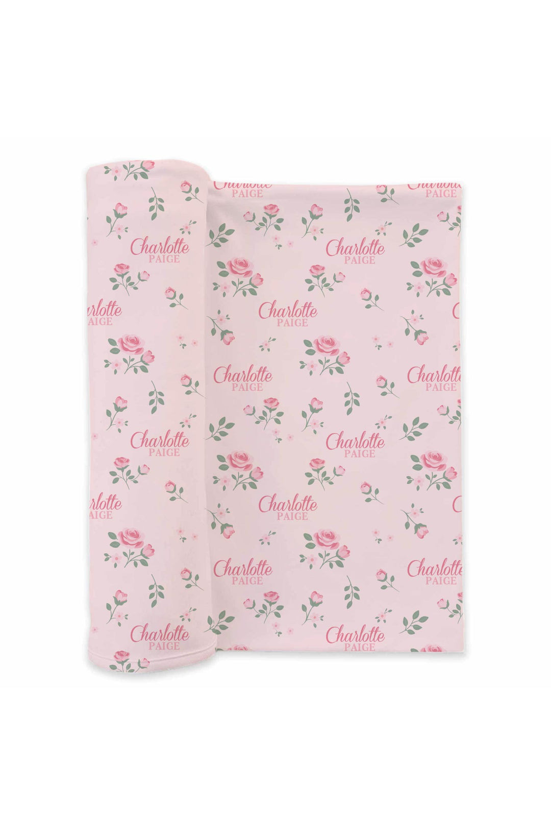 Caden Lane personalized baby swaddle blanket, Rose Garden Blush pink floral pattern with custom name, folded and rolled