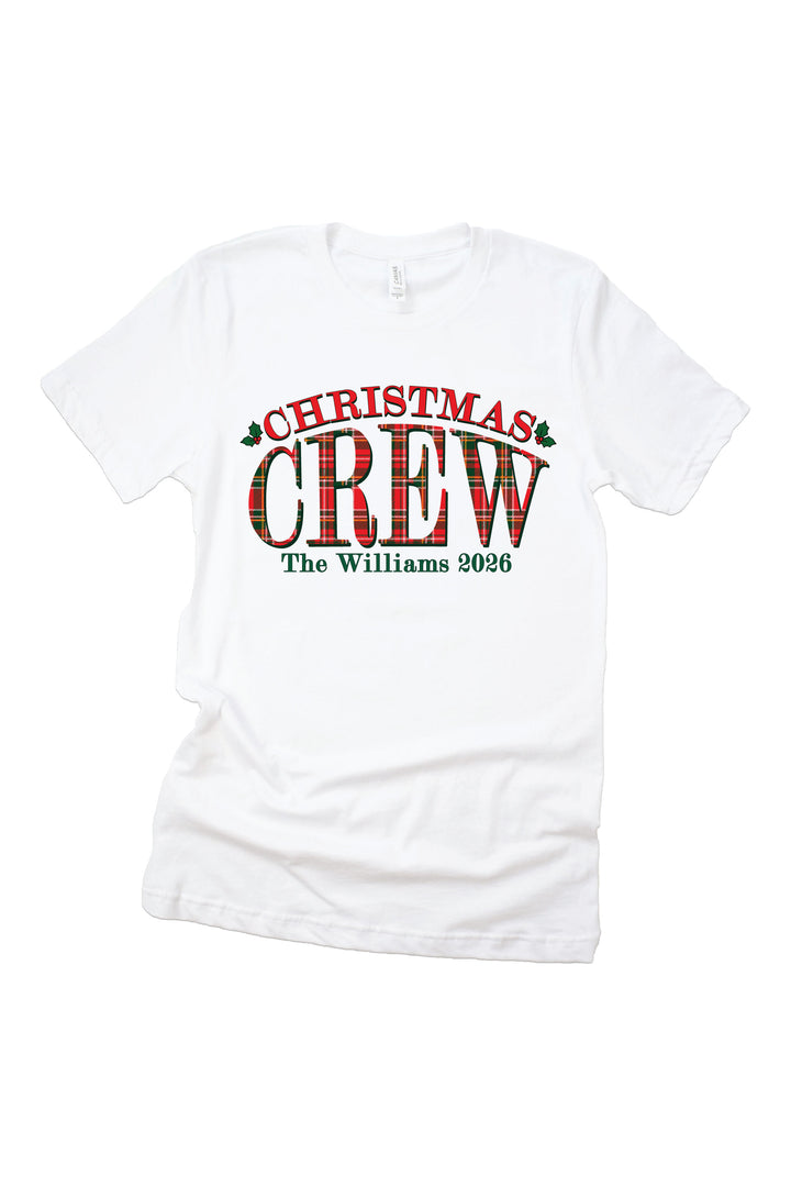Caden Lane personalized "Christmas Crew" graphic tee featuring a custom family name and year in festive plaid lettering, perfect for matching family Christmas pajamas, holiday photos, and personalized Christmas outfits.