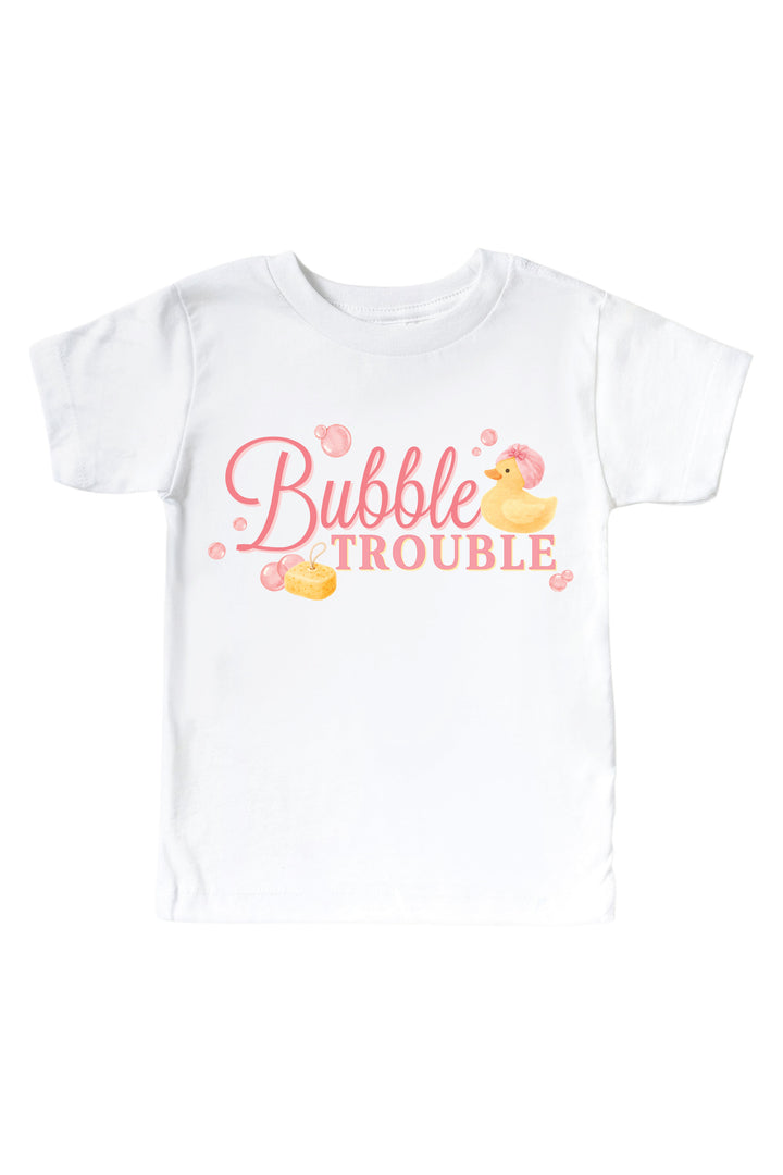White kids t-shirt with pink Bubble Trouble cursive text graphic and yellow rubber duck with pink bubbles on front
