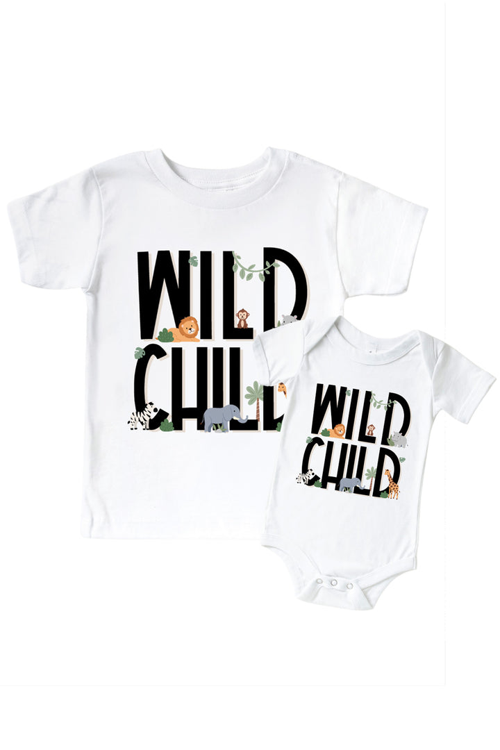 Caden Lane matching sibling shirt set in white with "Wild Child" printed in black letters and small safari animal illustrations, on both a kids' t-shirt and a baby bodysuit.