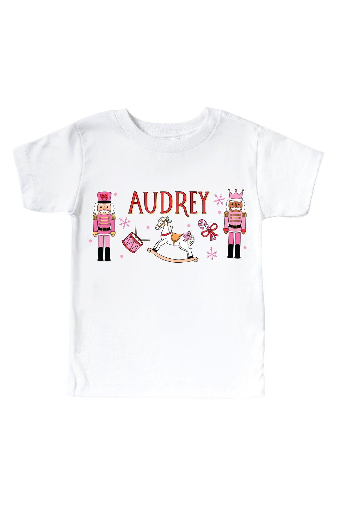 Shop the 'Personalized Toy Soldier Pink' Graphic Bodysuit or Kids' Tee | White, a custom Christmas style for babies and kids, perfect for holiday photos, parties, and gifting.