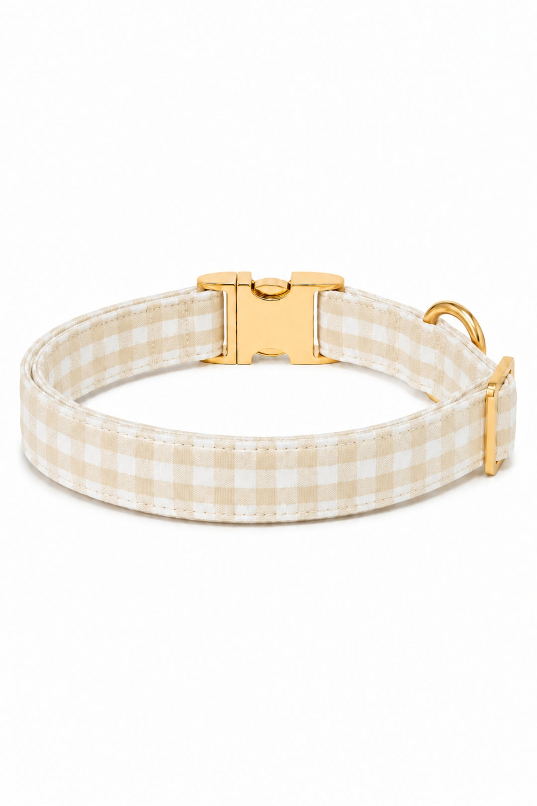 A Lane & Leash beige and white gingham check dog collar with a gold-tone metal buckle and D-ring, shown on a clean white background.