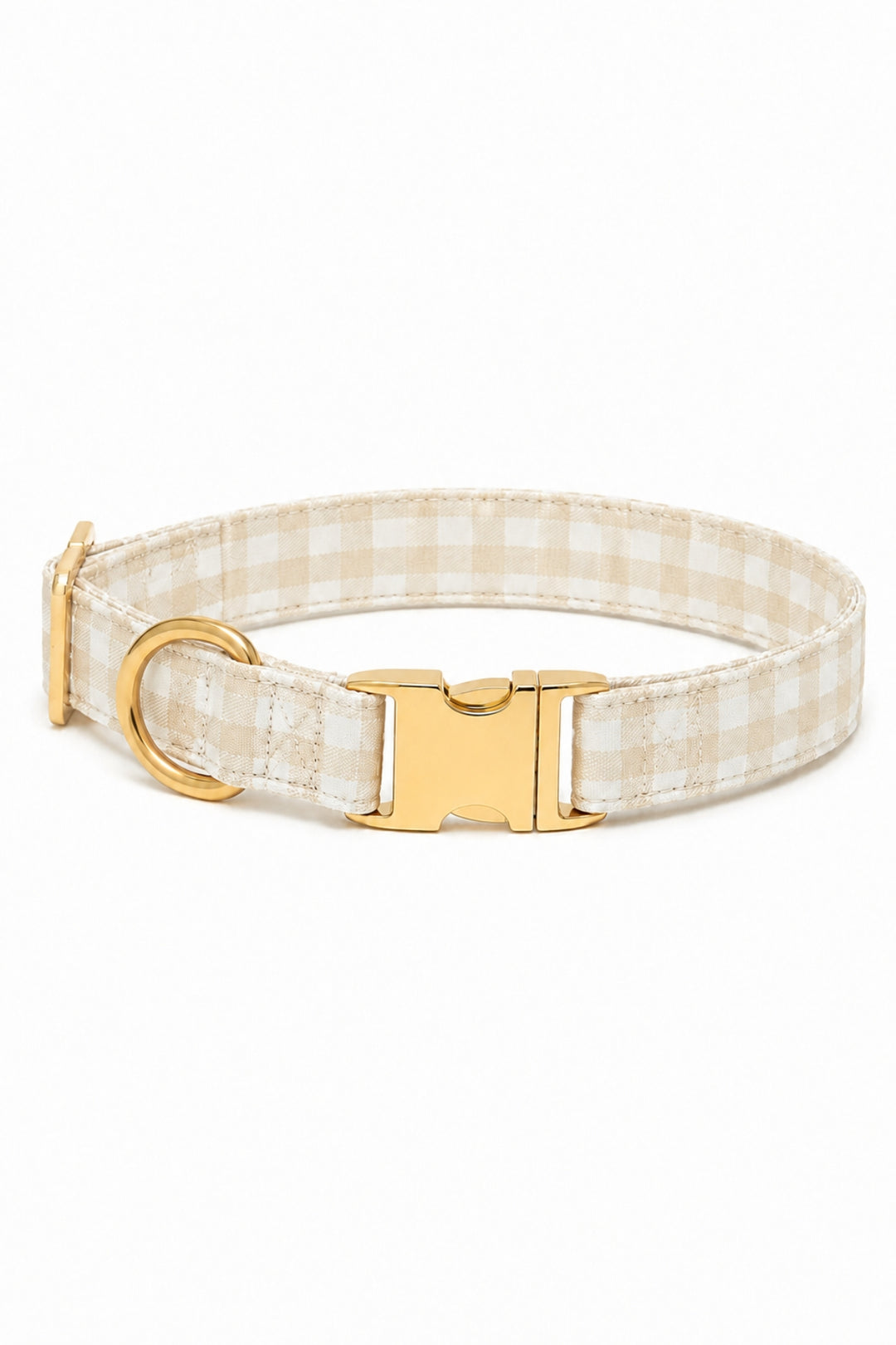 A Lane & Leash beige and white gingham check dog collar with a gold-tone metal buckle, D-ring, and adjustment slider, shown on a plain white background.
