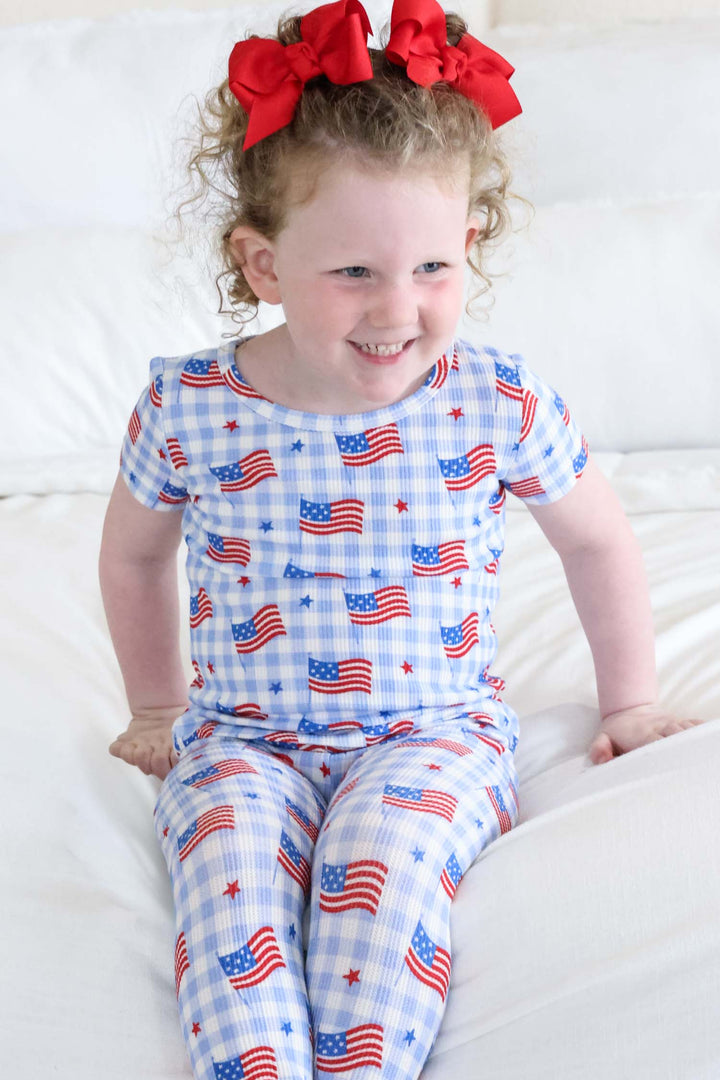 lifestyle photo of bamboo waffle two piece pajama set - star spangled picnic