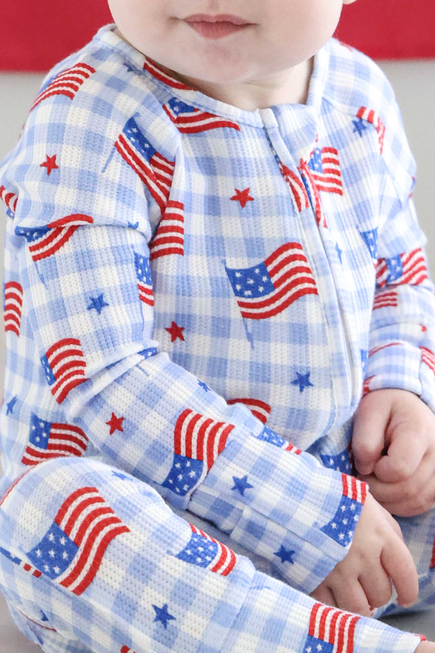 close-up of bamboo waffle star spangled picnic convertible zip romper