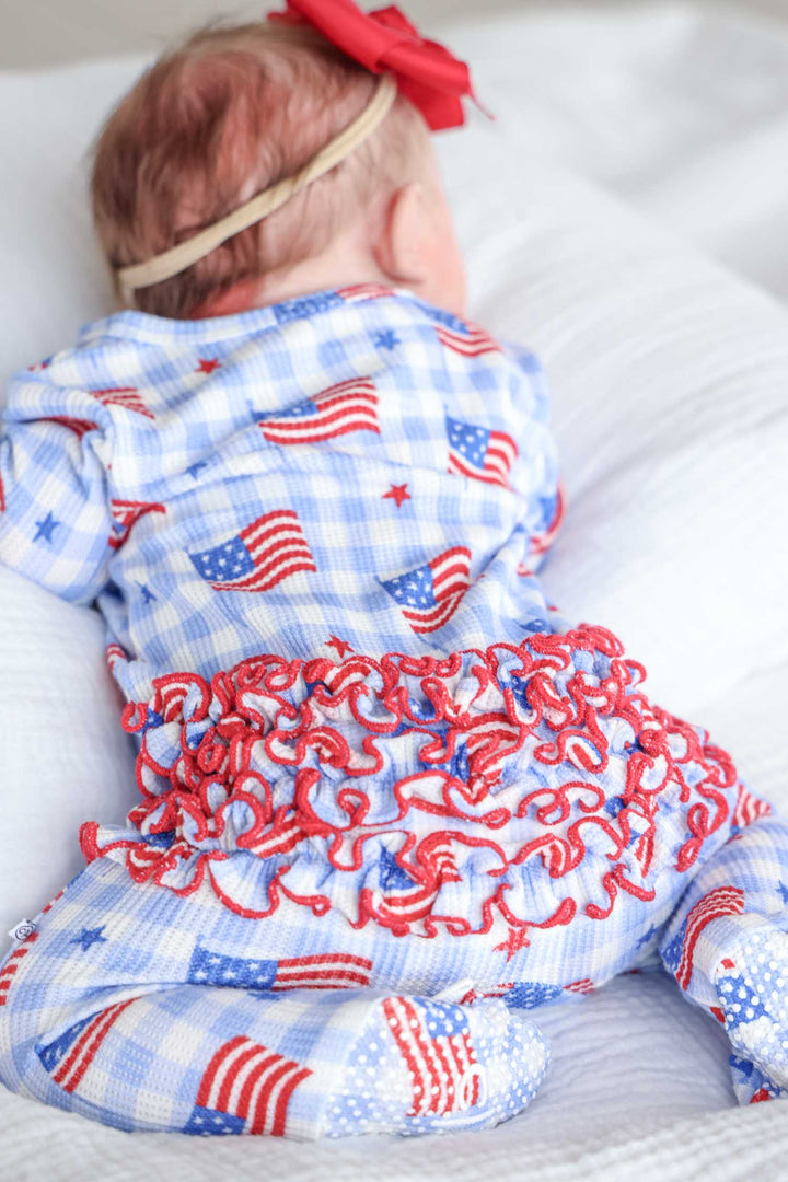detail view of red bamboo waffle ruffle zipper footie - star spangled picnic