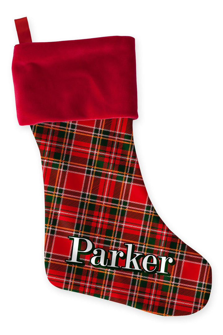 Caden Lane personalized Christmas stocking in classic red and green plaid with a red cuff and custom name, matching the holiday family pajama collection and festive Christmas décor.