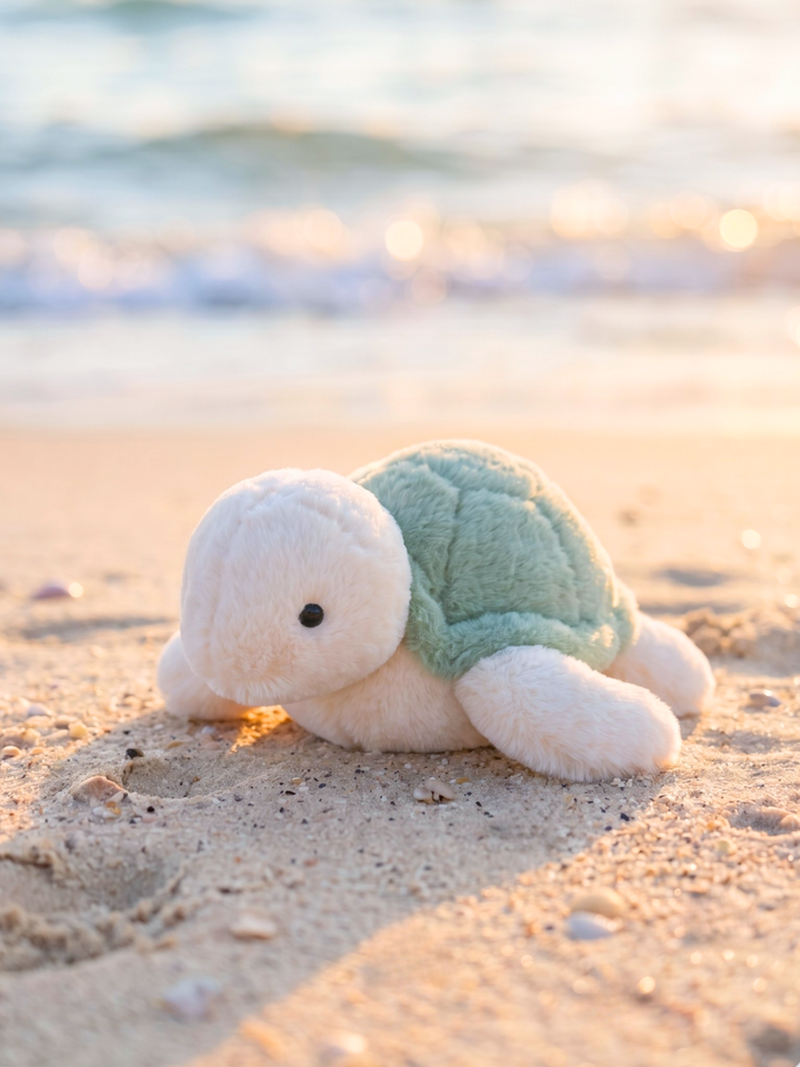 Large Cuddle Plush Friends | Splash Sea Turtle sitting on sad at the beach