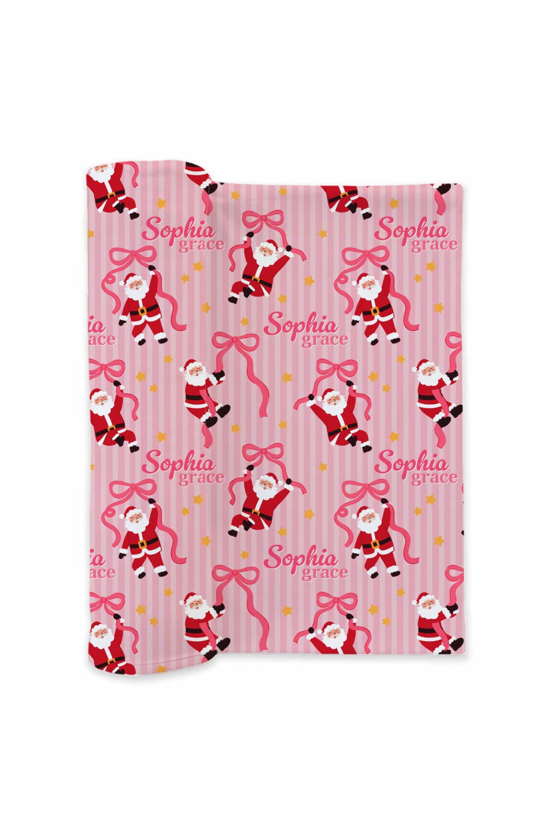 Caden Lane Personalized Jolly Ribbons Bamboo Swaddle Blanket featuring custom name personalization with festive Santa, ribbon bow, pink stripe, and holiday star print.