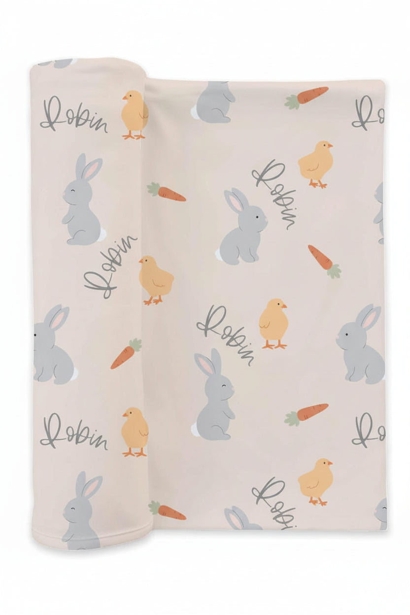 personalized swaddle blanket for newborn with bunnies, chicks and carrots 