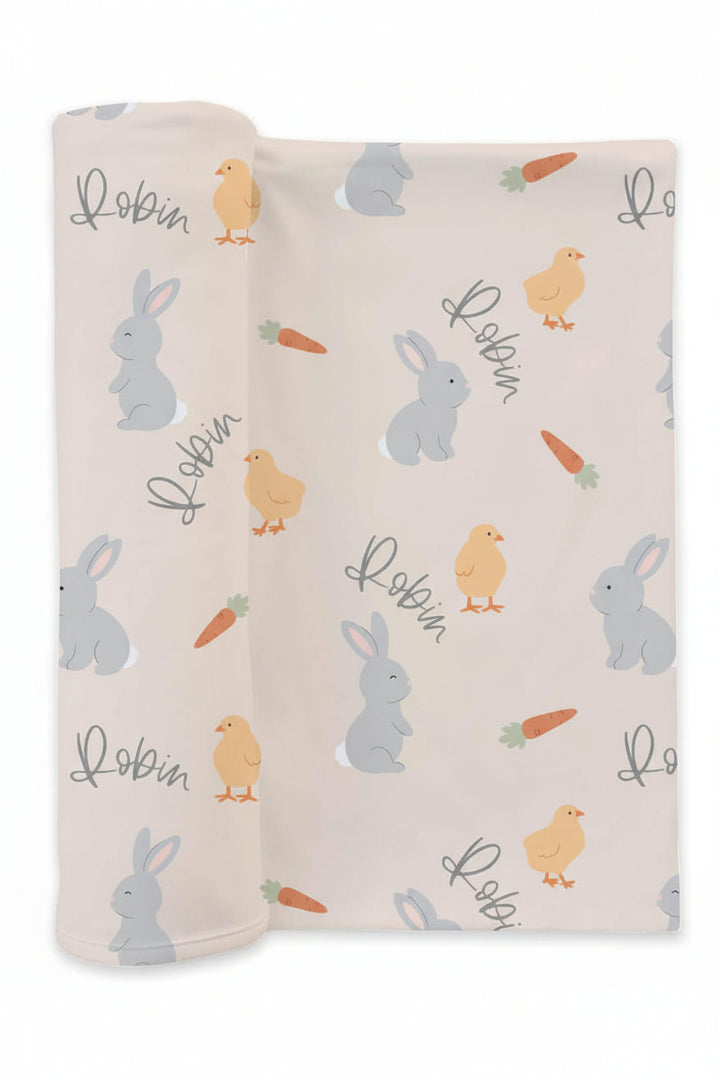 personalized swaddle blanket for newborn with bunnies, chicks and carrots 