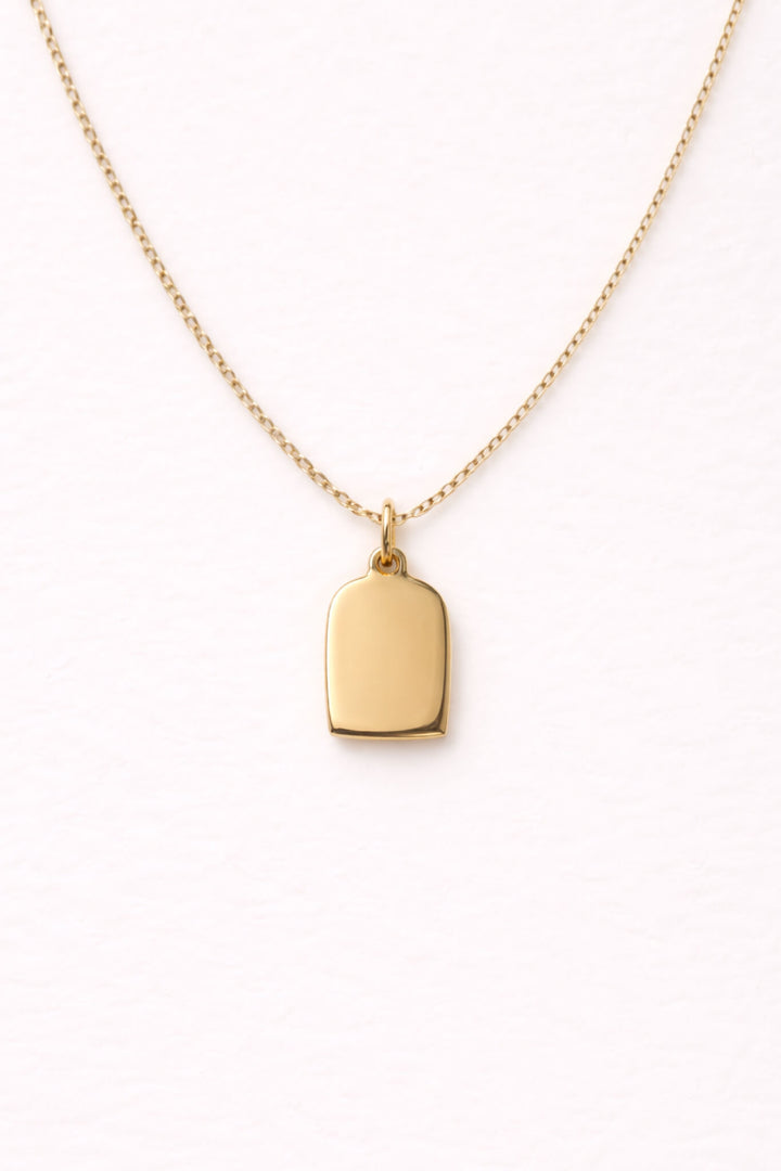 Caden Lane gold necklace with a blank engravable tag charm pendant